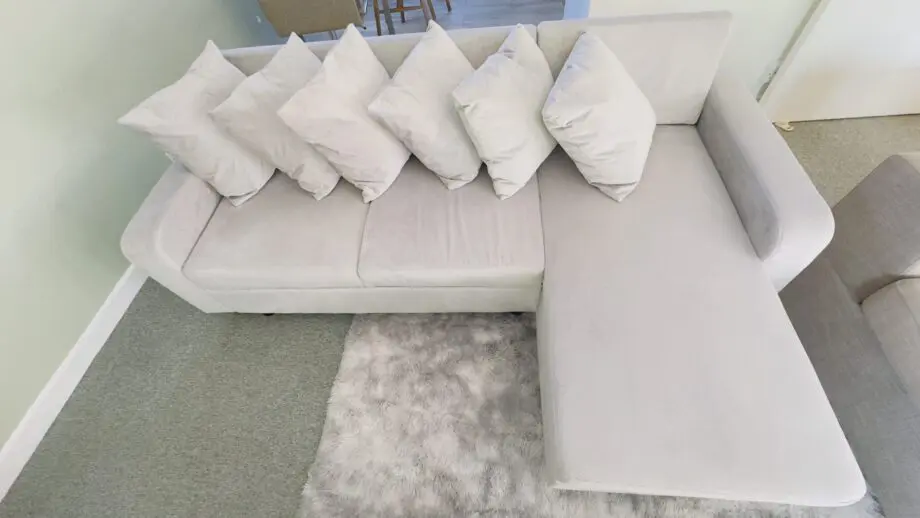 Laura James velvet sofa gray