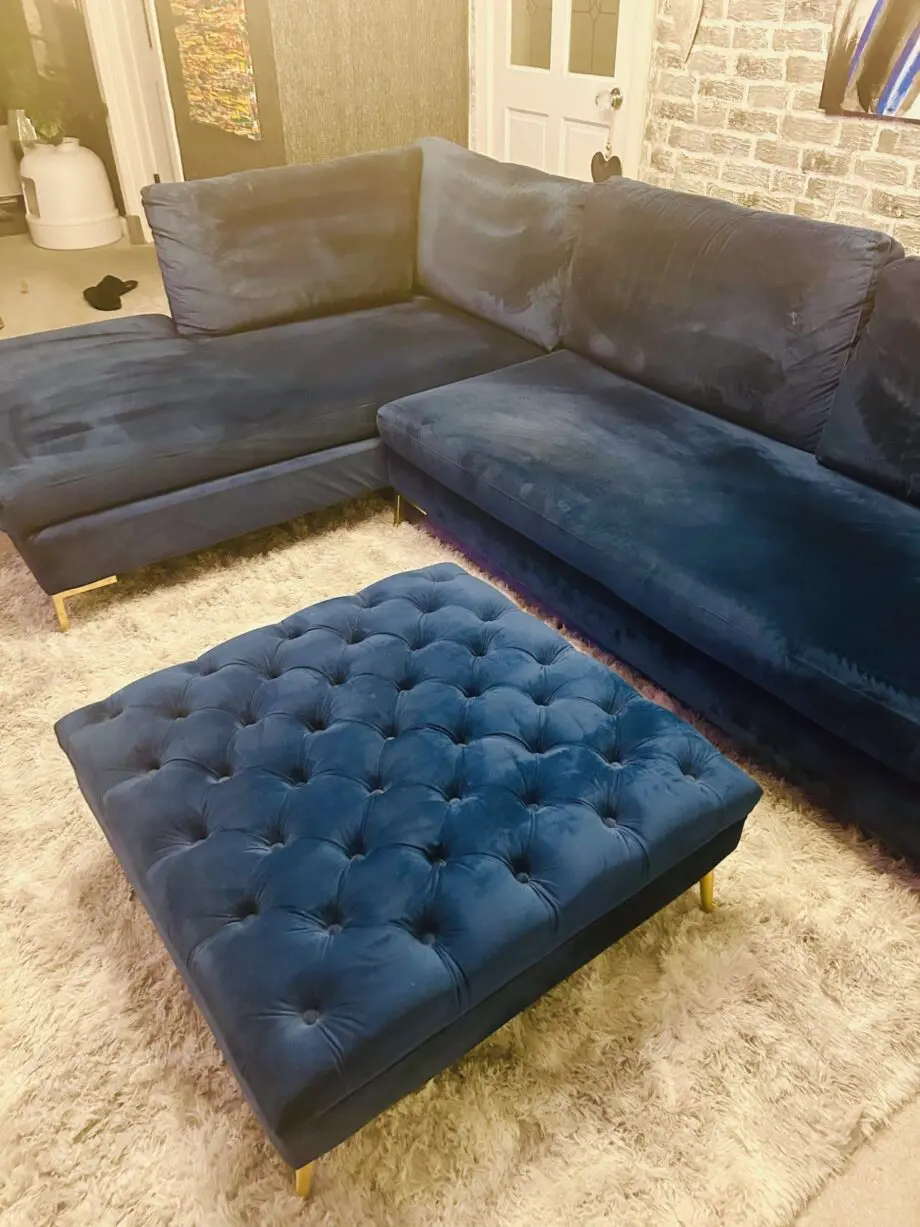 Blue velvet chaise corner sofa with ottoman
