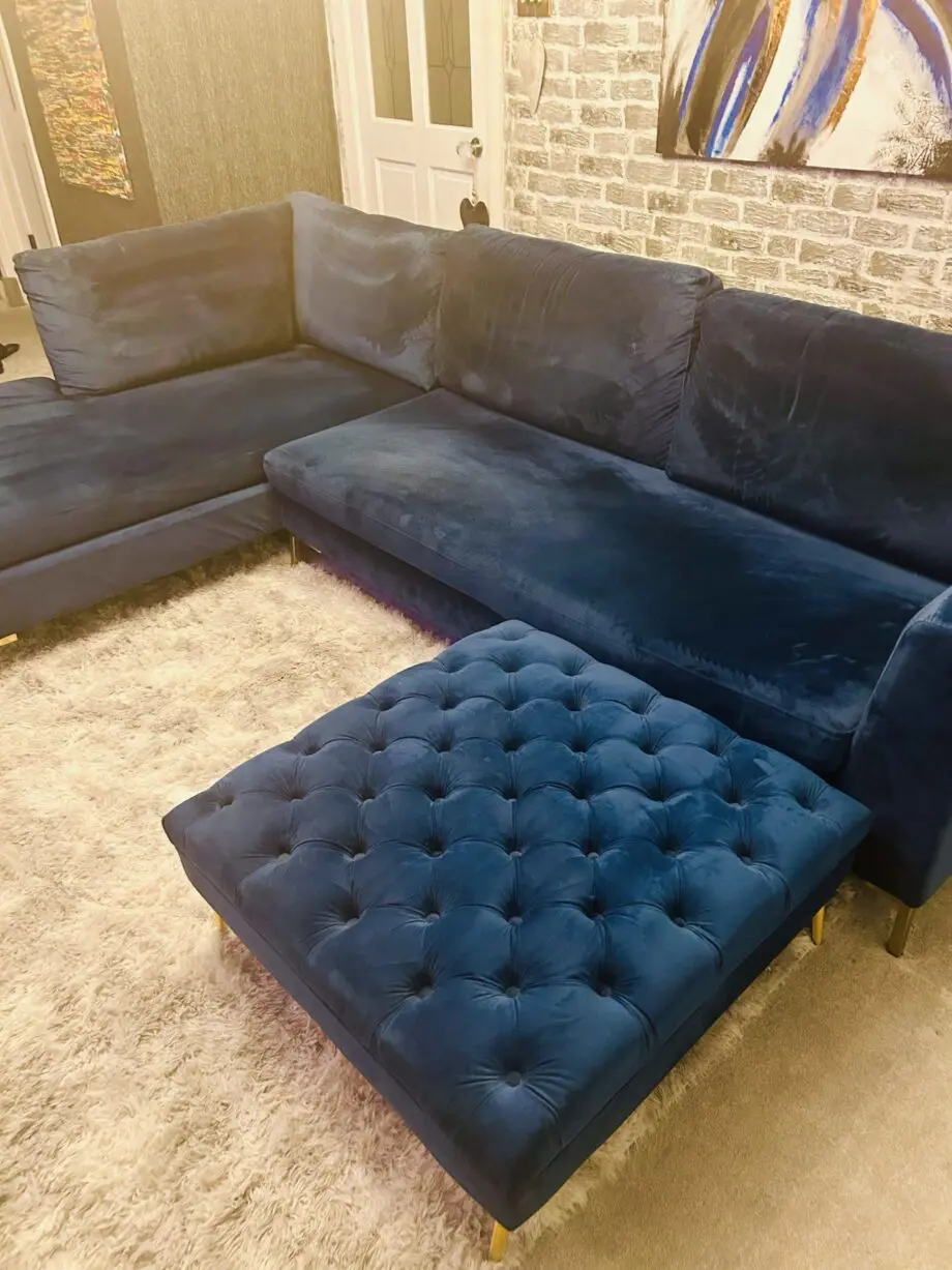 Blue velvet chaise corner sofa with ottoman