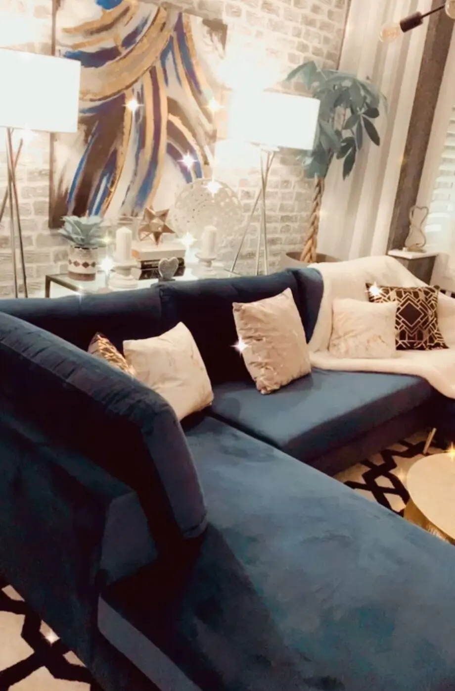 Blue velvet chaise corner sofa with ottoman