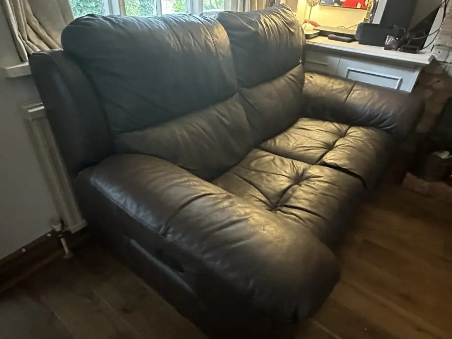 Leather, electric recliner 2 seater.