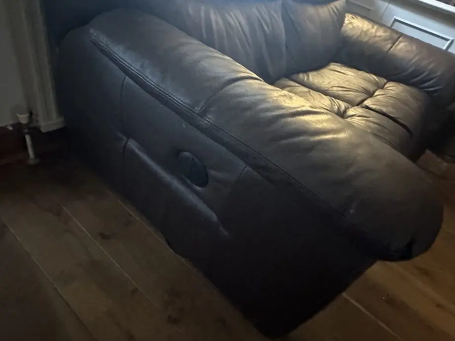Leather, electric recliner 2 seater.