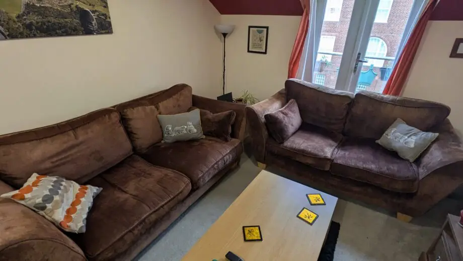 2-seater and 3-seater brown sofa pair for sale