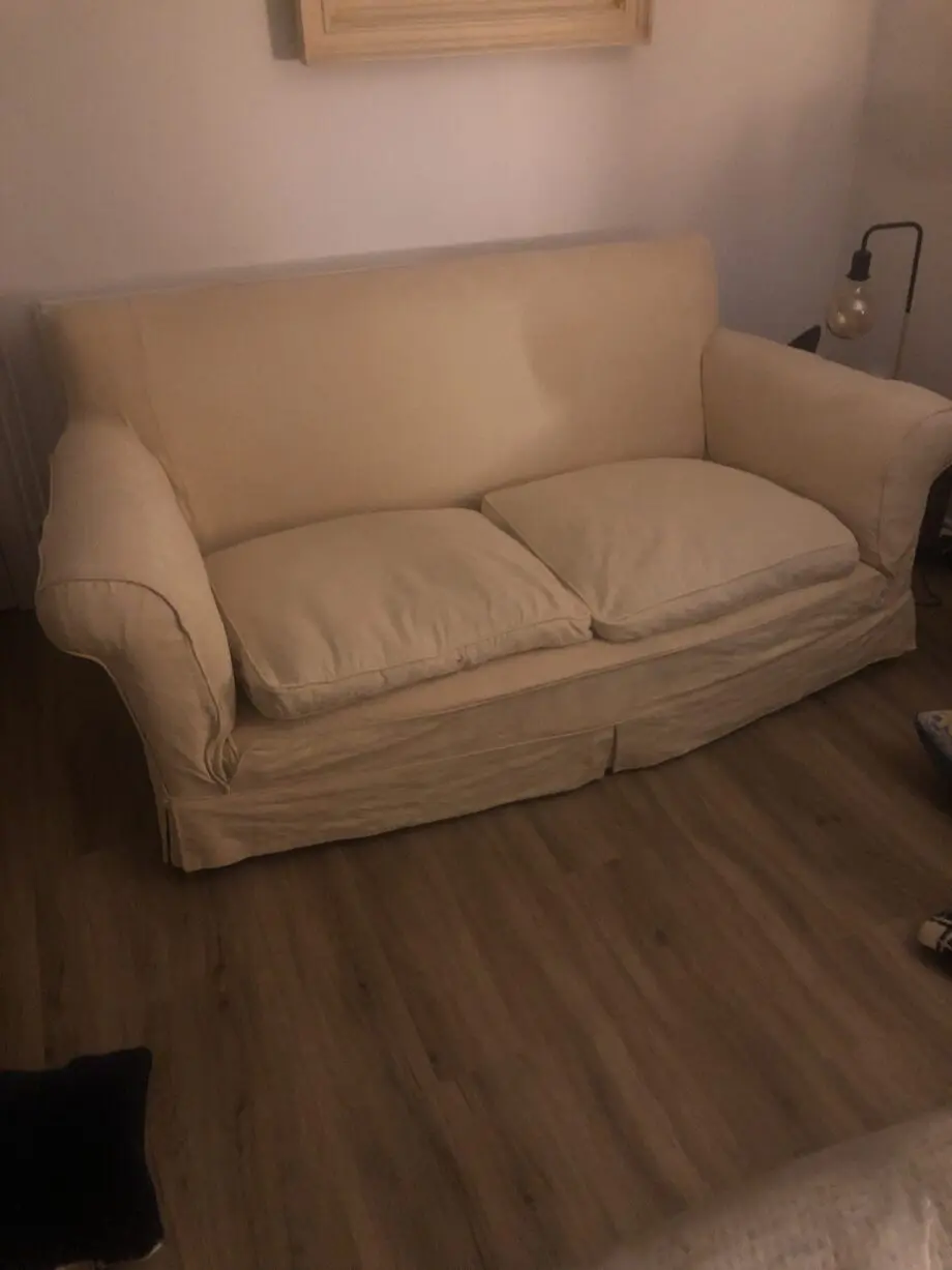 Old deep seated sofa