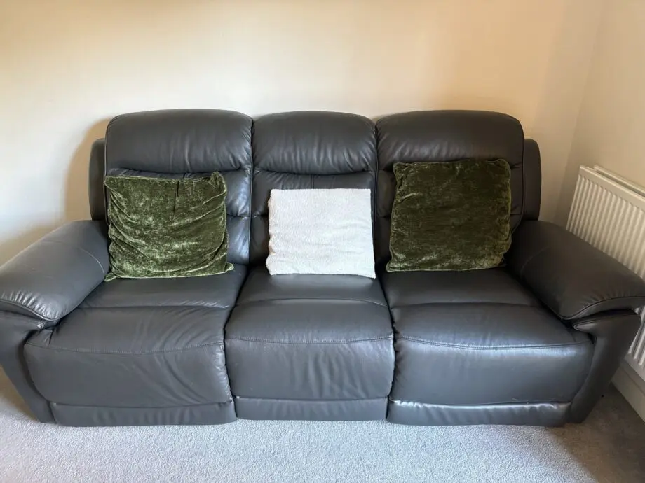 Brand new leather recliner sofas with charging outlets!