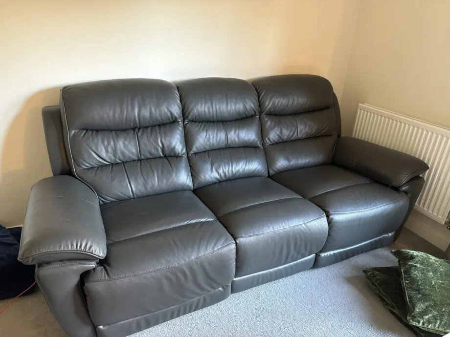 Brand new leather recliner sofas with charging outlets!