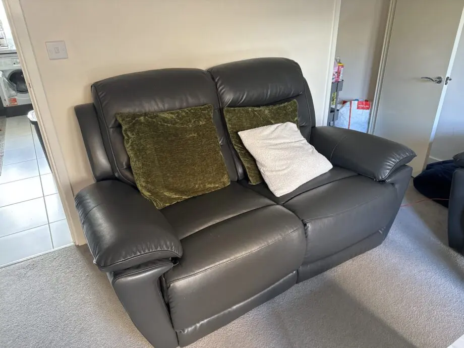 Brand new leather recliner sofas with charging outlets!