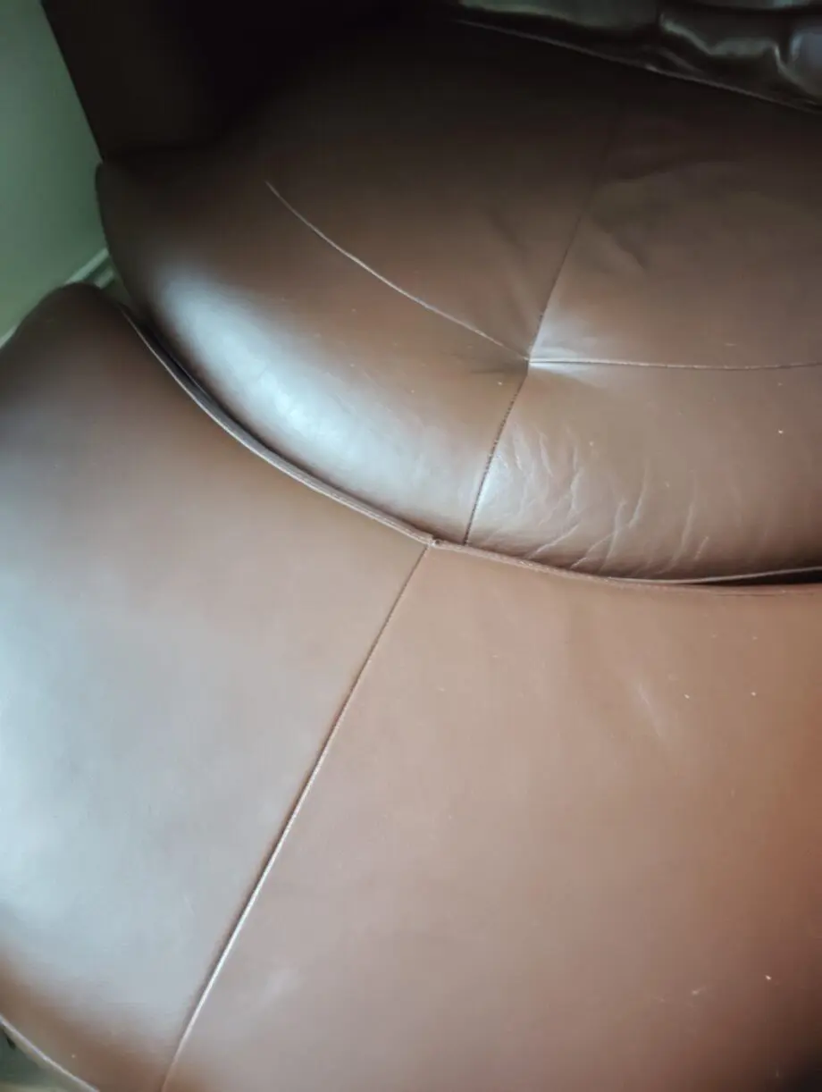 Dark brown spinning cuddle chair