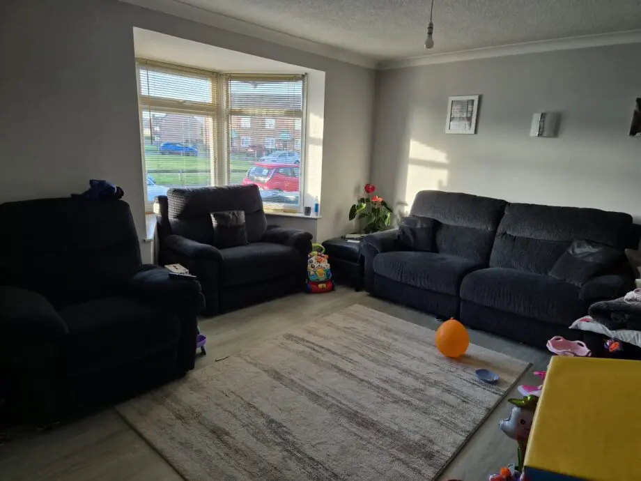 3 piece black material sofa set