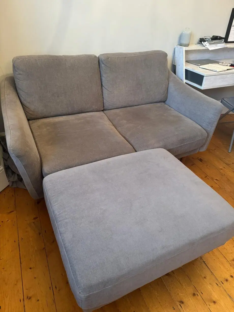 SNUG two-seater "Rebel" gray sofa with ottoman