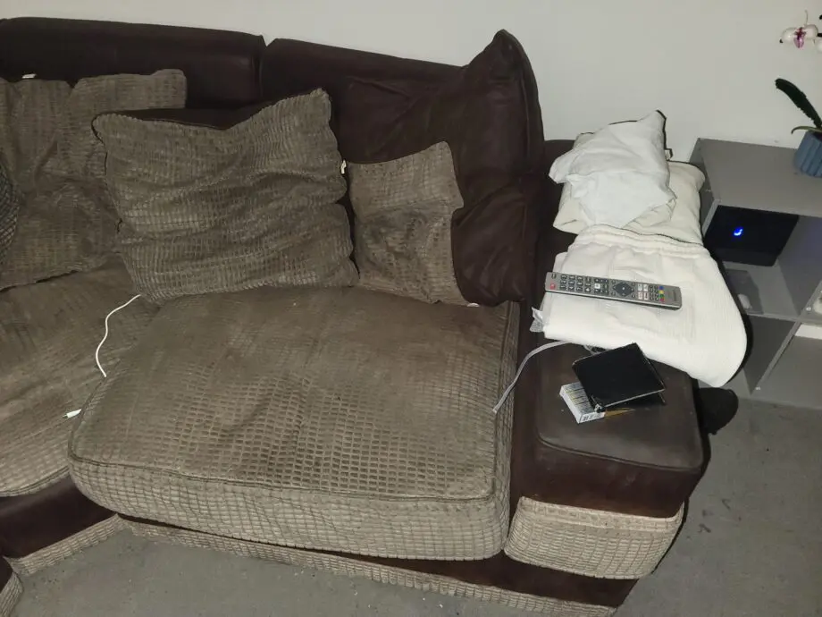 4 seat, L shaped Brown Sofa