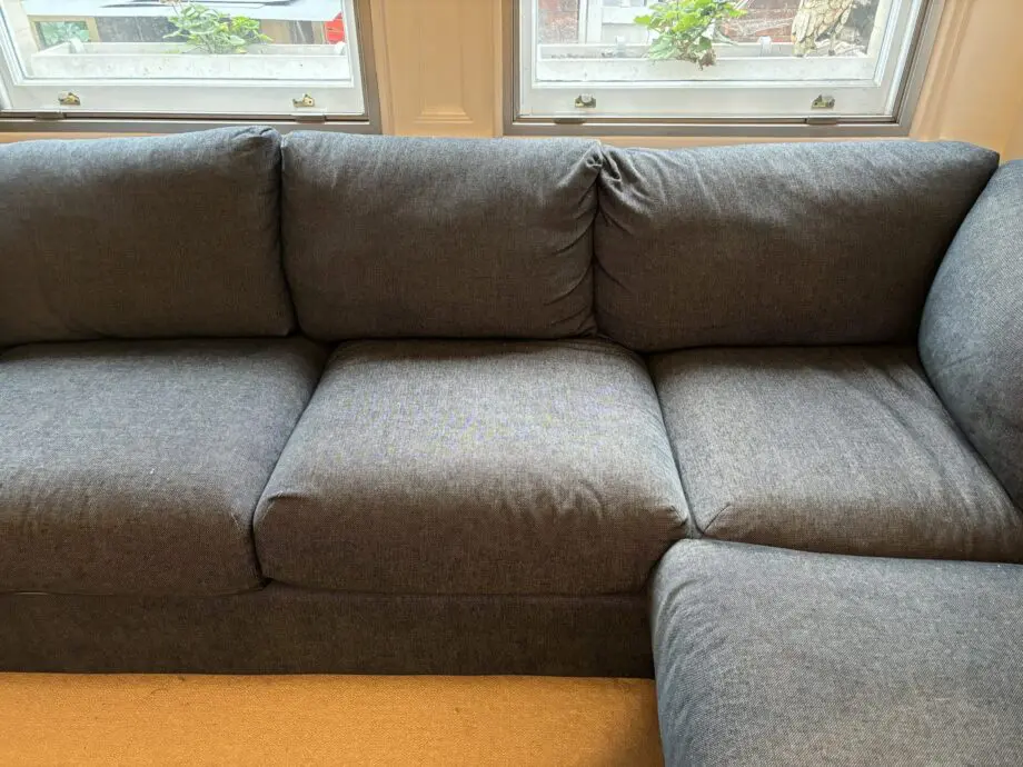 8 seater corner sofa. Dark blue.