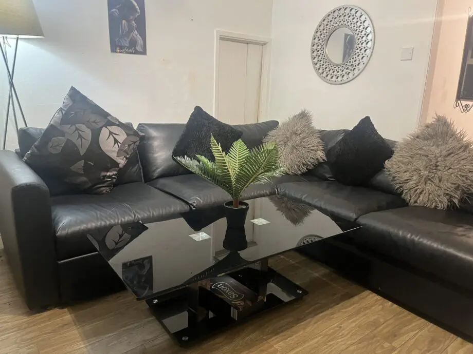 L shaped leather sofa with storage