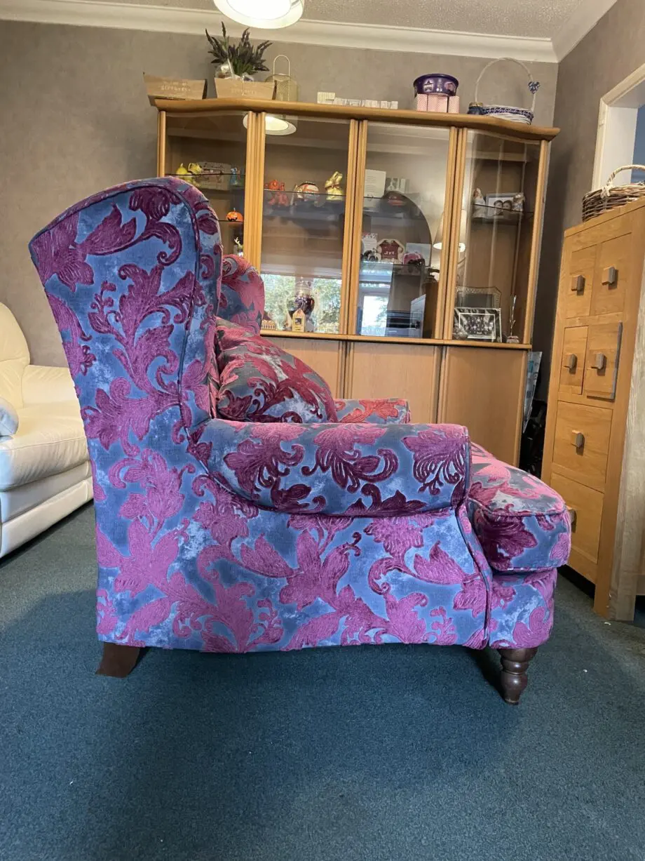 Sofology Liherte purple and grey fabric wingback style chair.