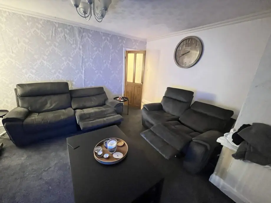 2 grey electric recliner sofas