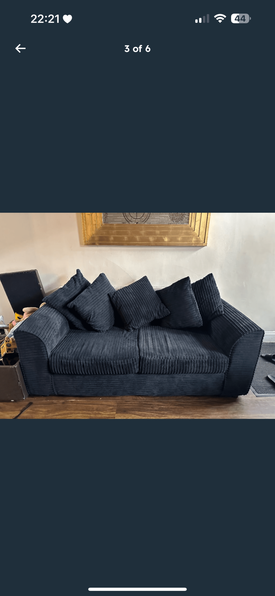 Black plush sofas