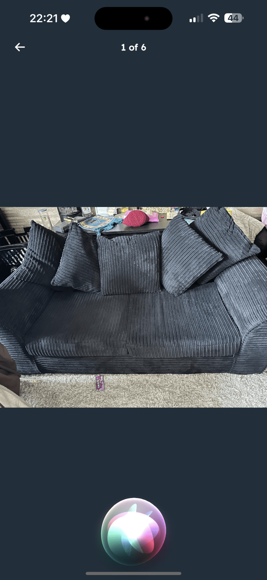 Black plush sofas