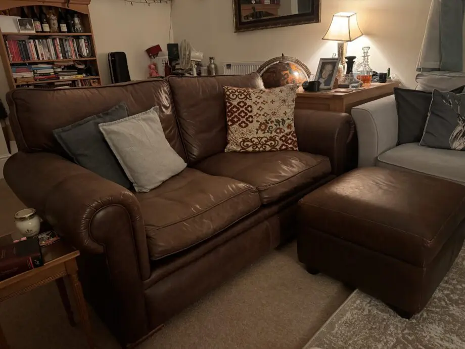 Divine brown leather sofa and matching footstool