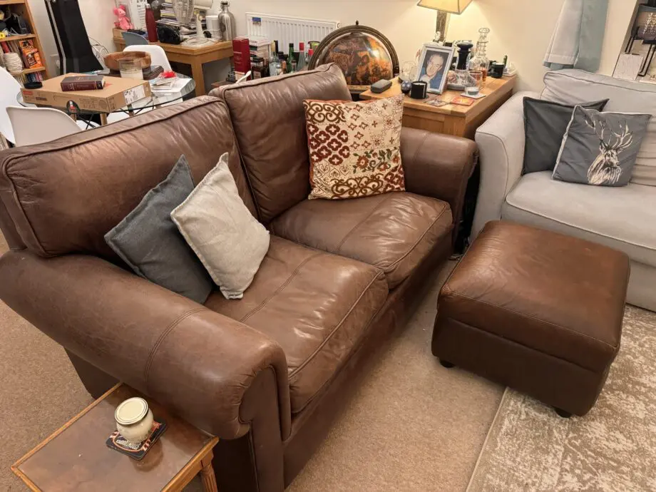 Divine brown leather sofa and matching footstool