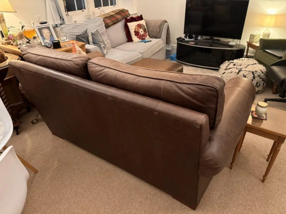 Divine brown leather sofa and matching footstool