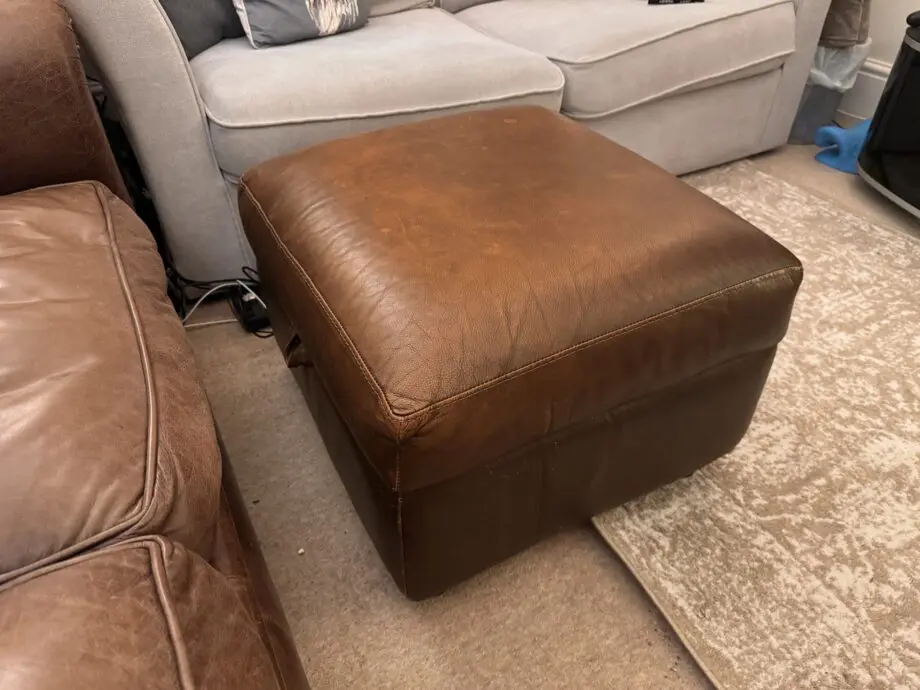 Divine brown leather sofa and matching footstool