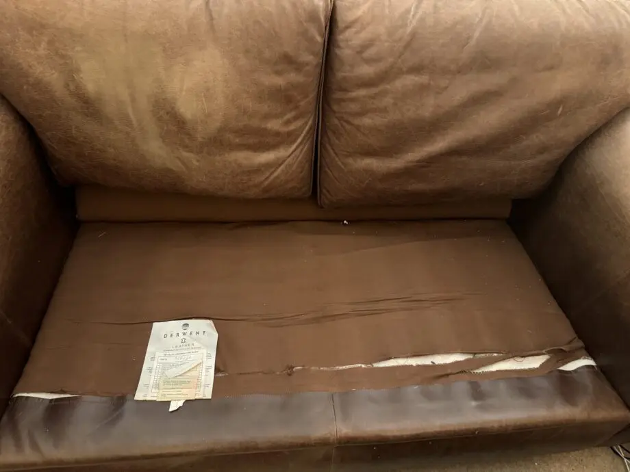 Divine brown leather sofa and matching footstool