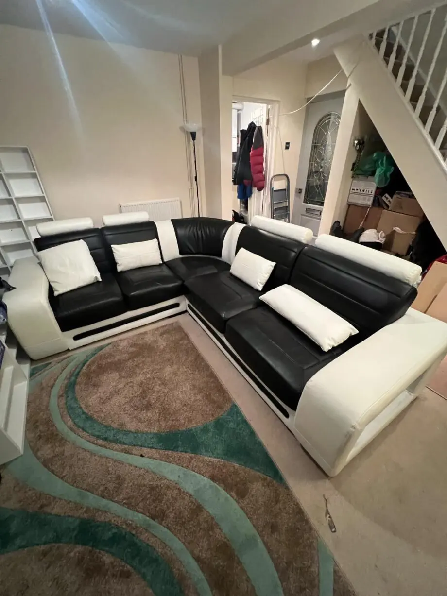 Black and white Leather Racer back L shaped sofa