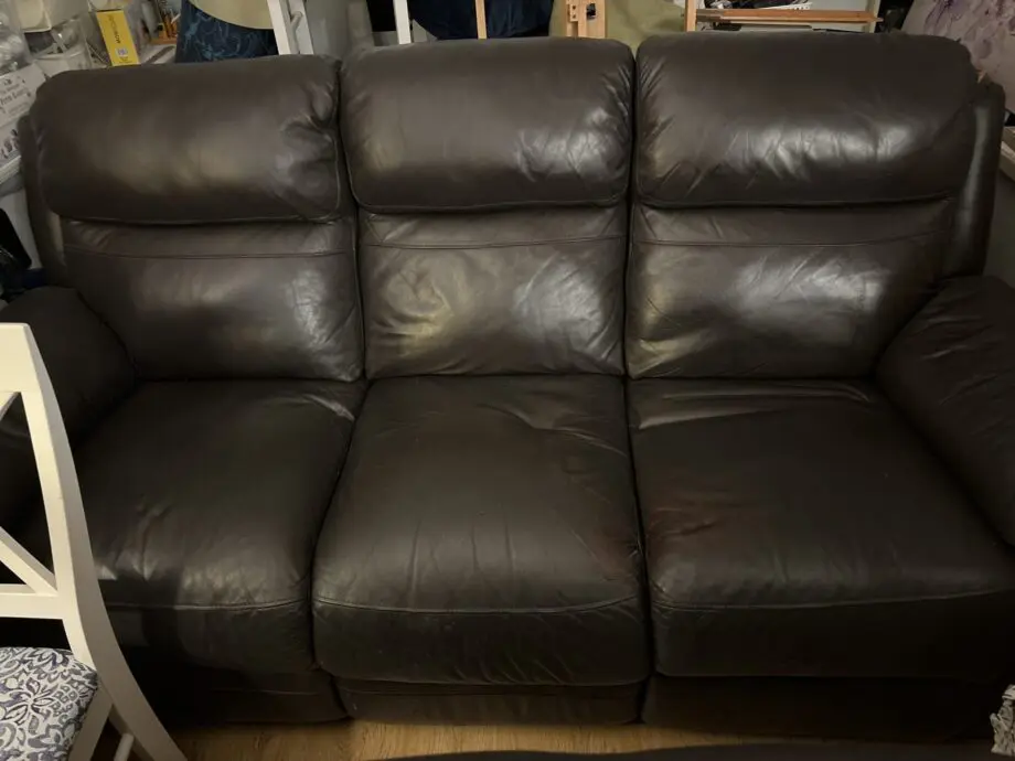 Dark brown leather sofa double recliner