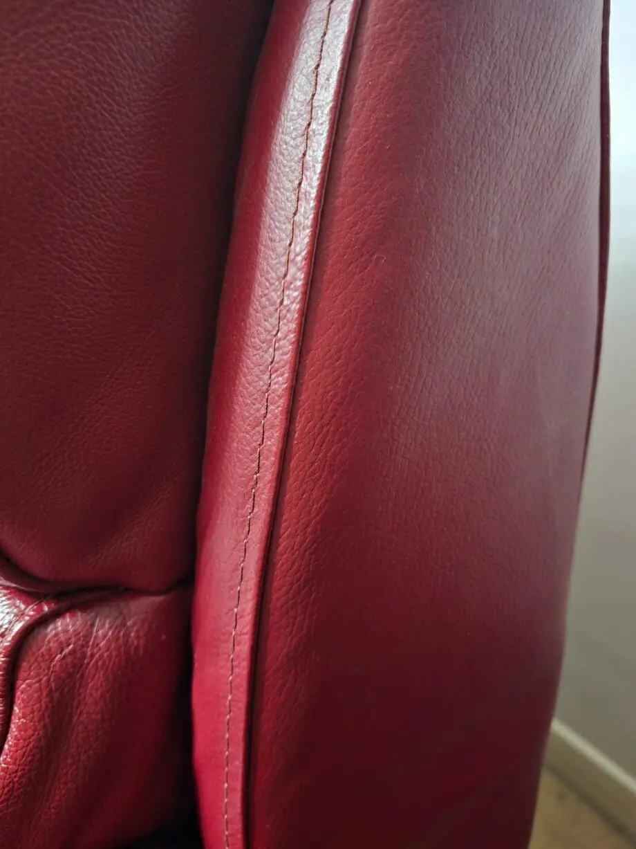 Two Navona reclining sofas, dark red, leather