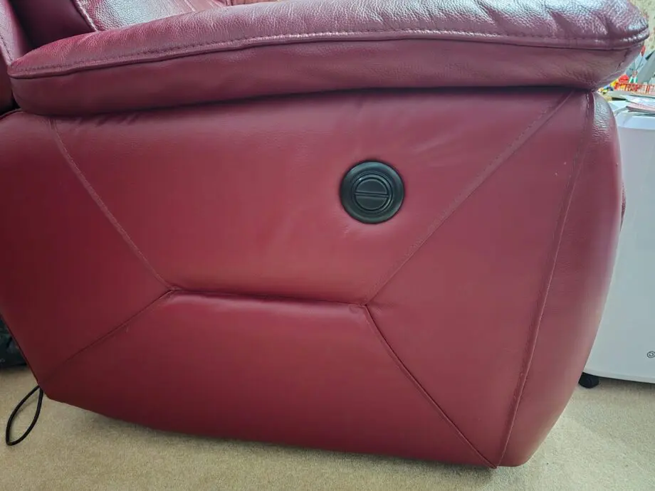 Two Navona reclining sofas, dark red, leather