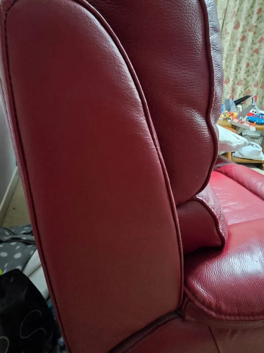 Two Navona reclining sofas, dark red, leather