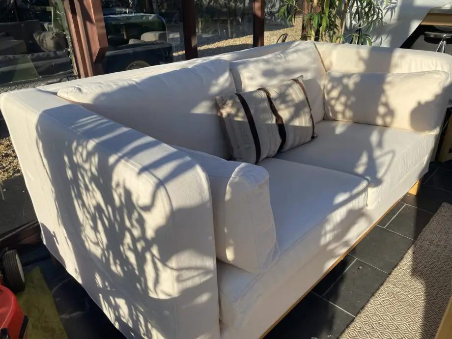 A PAIR of two seater sofas made by MultiYork
