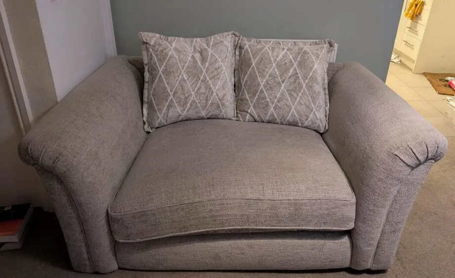 Grey loveseat and matching recliner 2 seater
