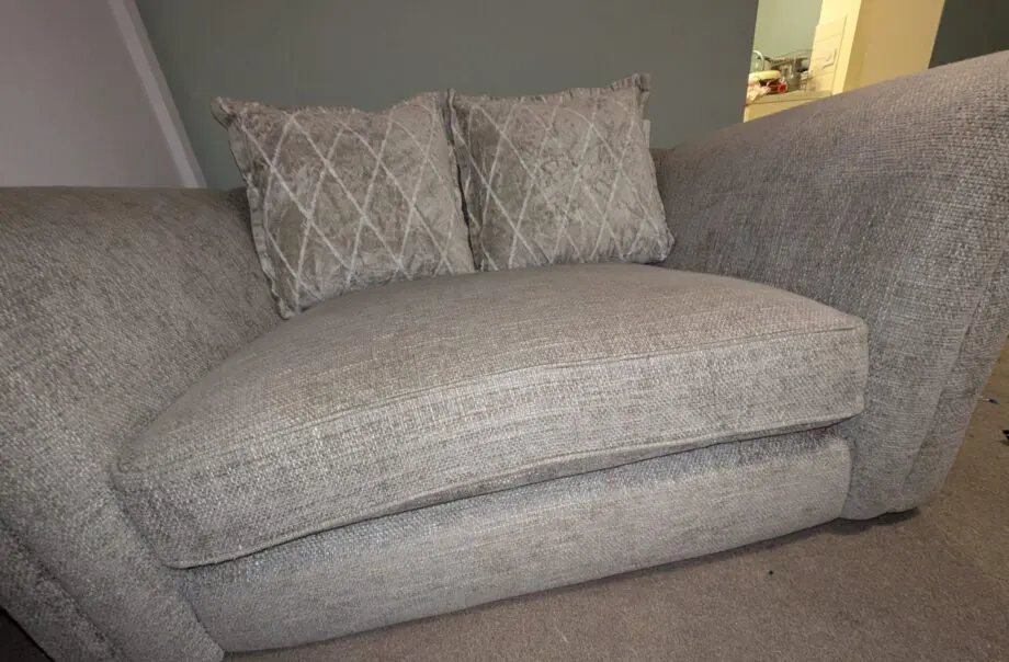 Grey loveseat and matching recliner 2 seater