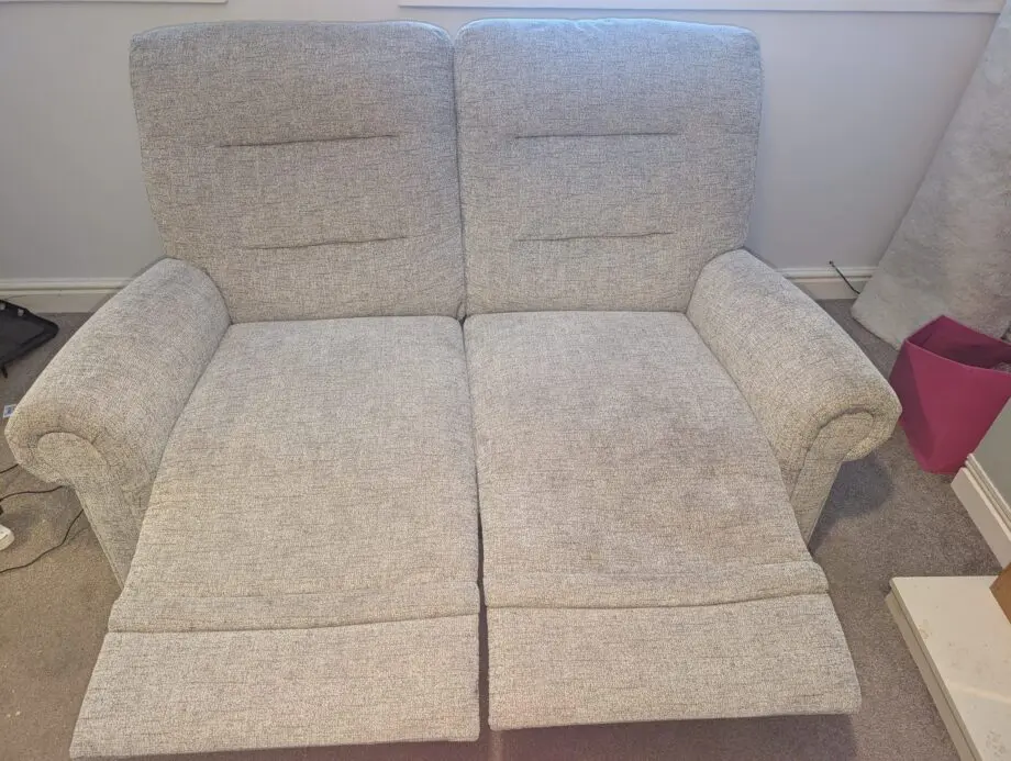 Grey loveseat and matching recliner 2 seater