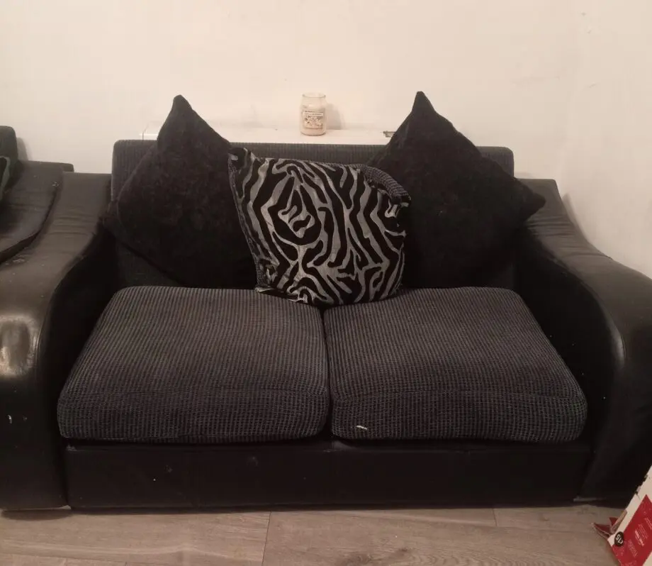 DFS Leather and fabric sofa black