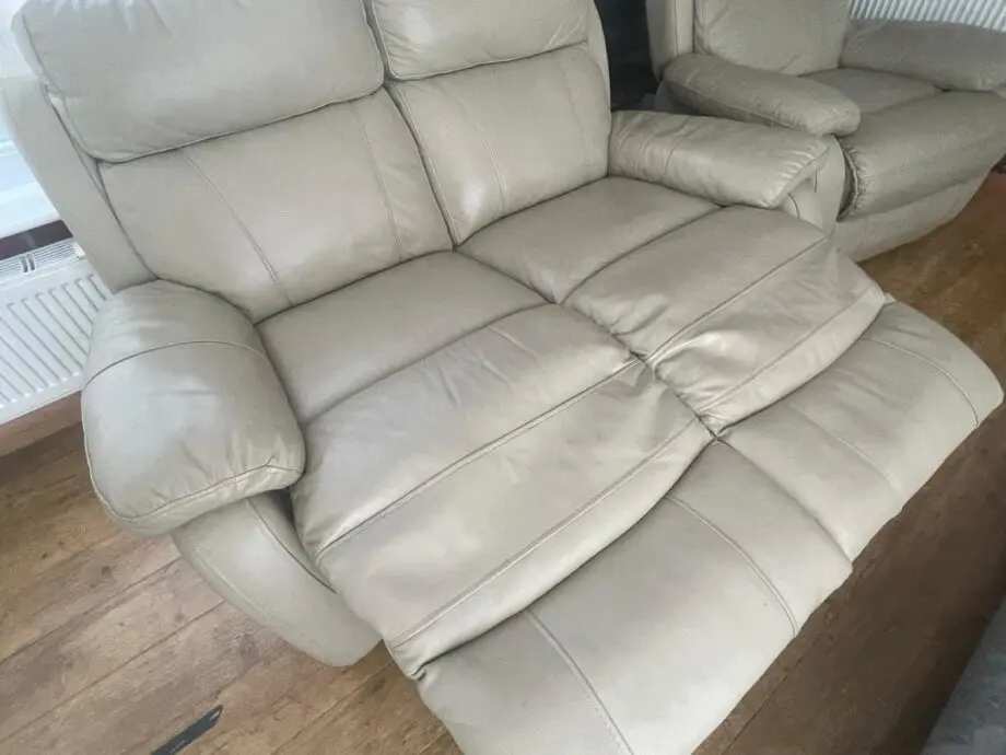 Cream leather 2 seat sofa and armchair