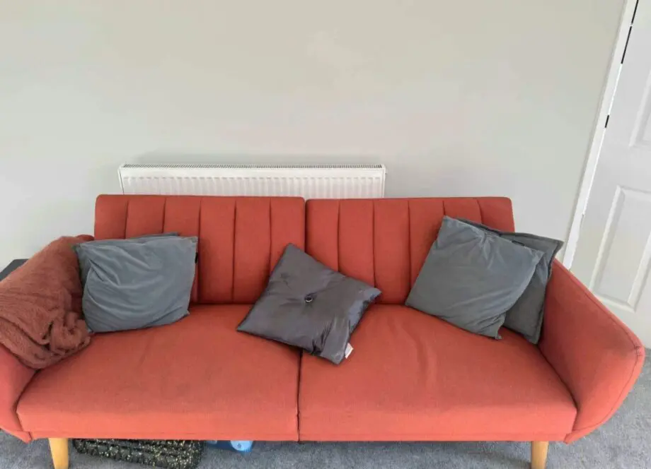 Sofa Bed, burnt orange.