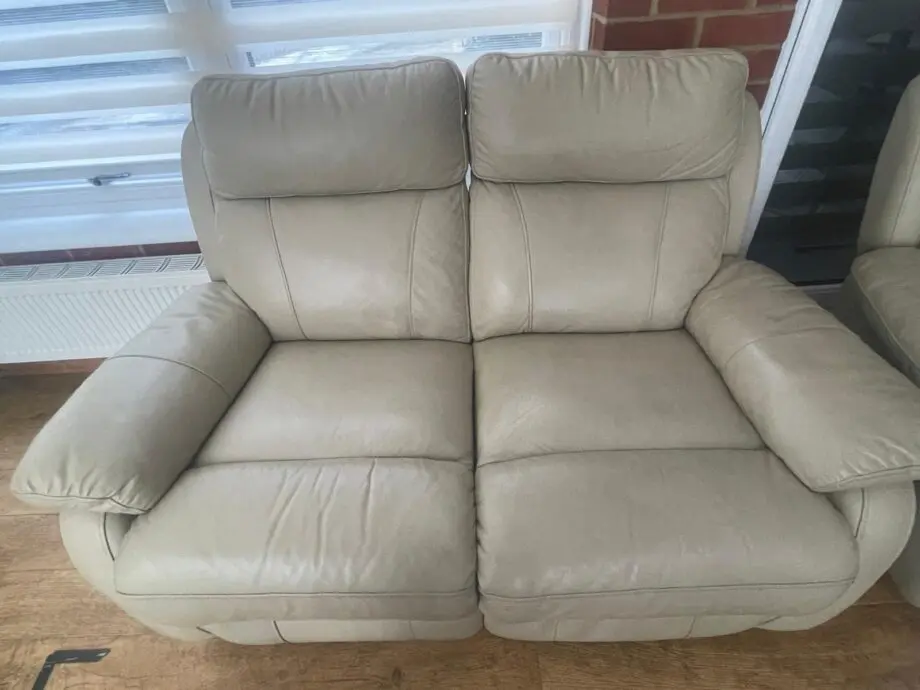 Cream leather 2 seat sofa and armchair