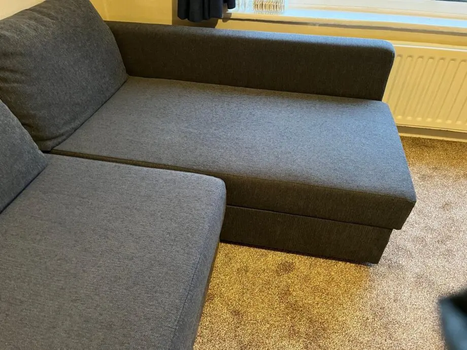 Ikea Frihiten L shaped sofa bed dark grey