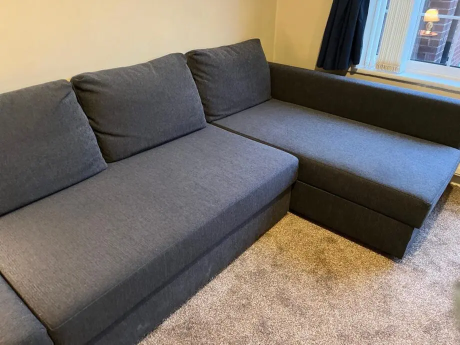 Ikea Frihiten L shaped sofa bed dark grey