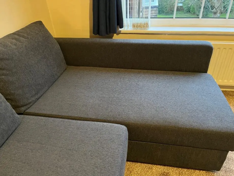Ikea Frihiten L shaped sofa bed dark grey