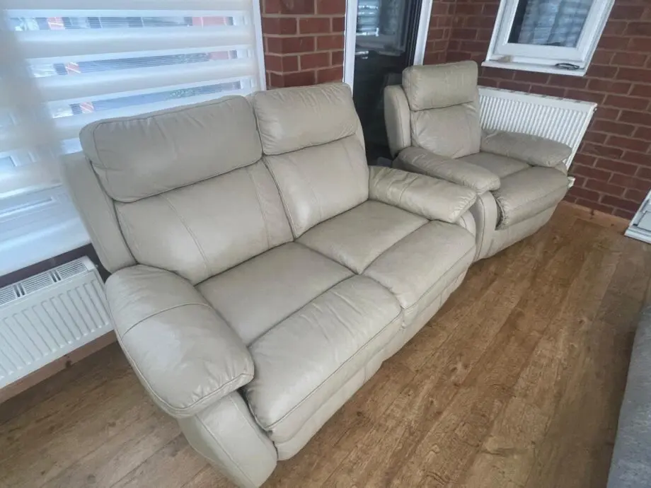 Cream leather 2 seat sofa and armchair