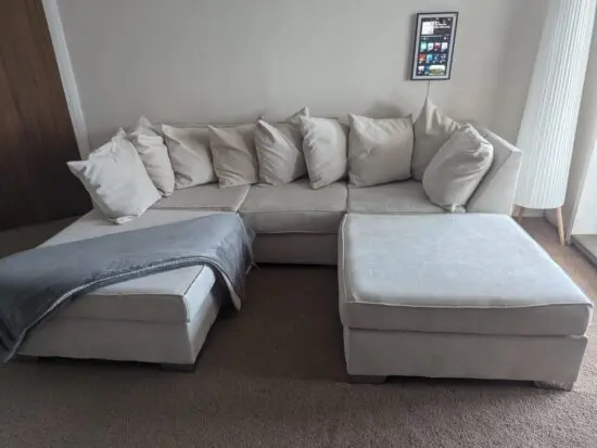 3 seater sofa that can be U shape or L shape either way.