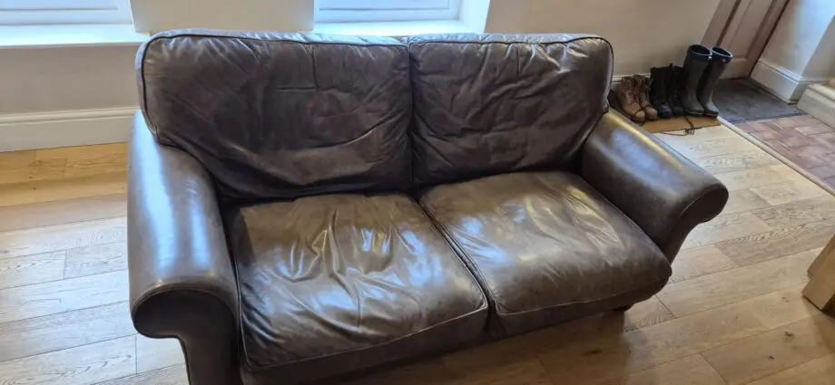 Laura Ashley brown leather sofa