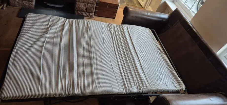 Laura Ashley brown leather sofa