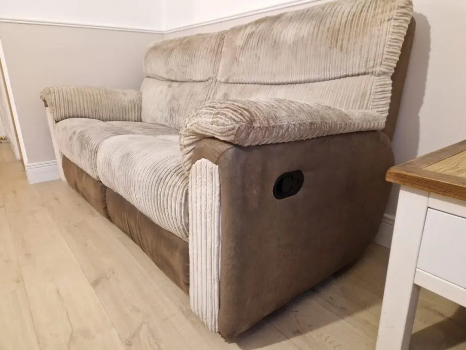 Brown and beige recliner sofas
