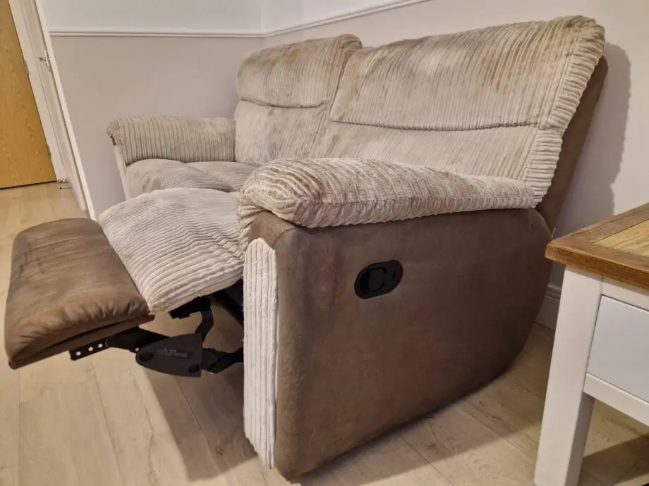 Brown and beige recliner sofas