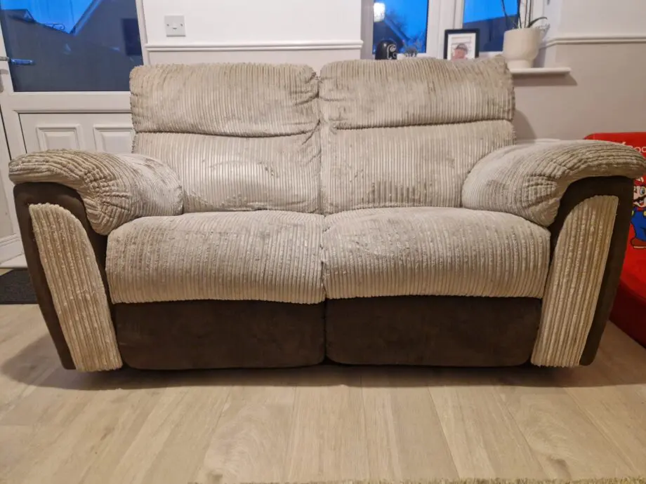 Brown and beige recliner sofas