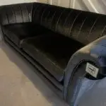 Dark grey velvet style three seater couch - practically brand new